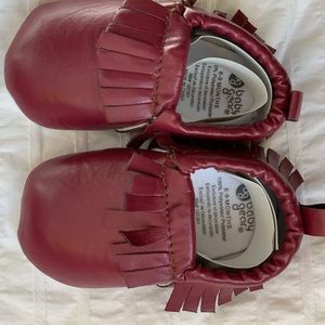 Maroon brand new moccasins. Size 0-6 months